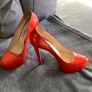 Prada red pumps